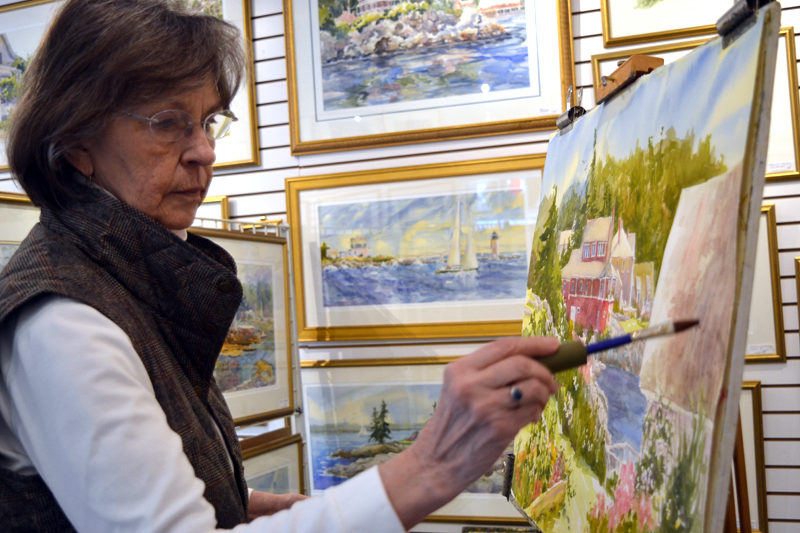 Damariscotta painter Jan Kilburn at work on a watercolor painting in her Bristol Road studio that doubles as an art gallery. (Christine LaPado-Breglia photo)