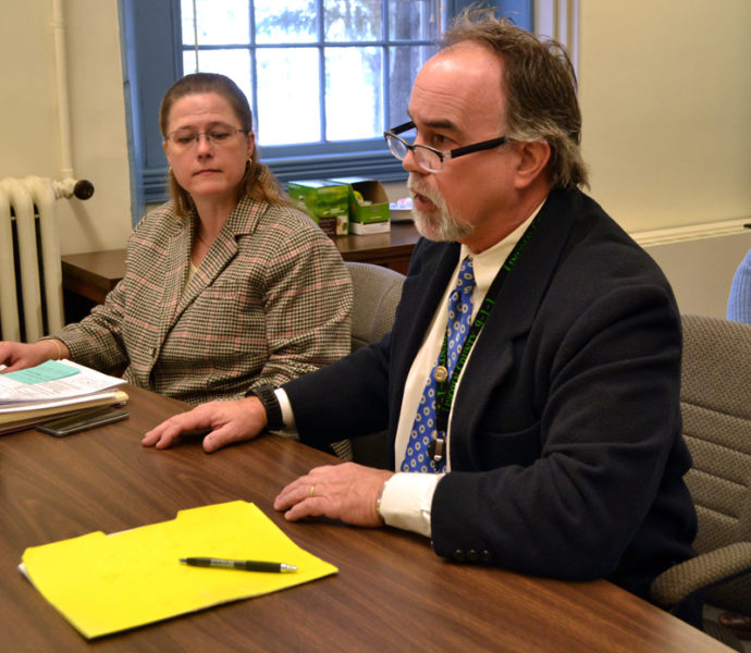 Lincoln County Communications and Emergency Management Agency Director Tod Hartung bids farewell to the Lincoln County Board of Commissioners during a board meeting Tuesday, Jan. 17. (Charlotte Boynton photo)