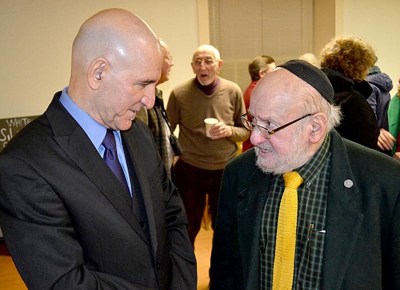 Reza Jalali (left) and Rabbi Steve Shaw speak after a Martin Luther King Jr. Day celebration at The Second Congregational Church in Newcastle on Monday, Jan. 16. (Abigail Adams photo)