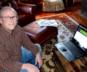 Tim Cheney demonstrates how the Overdose Warning Network application will enable real-time reporting and analysis of opioid overdoses at his South Bristol home Thursday, Jan. 5. (Abigail Adams photo)