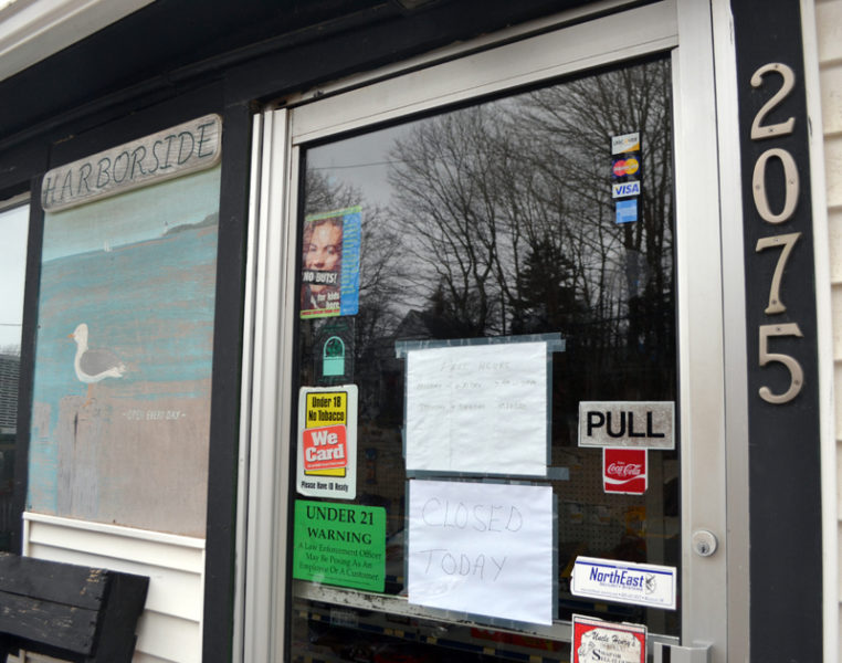 A sign on the door at Harborside Cafe and Market in South Bristol reads "closed today." The sign has been on the door since November. (Maia Zewert photo)