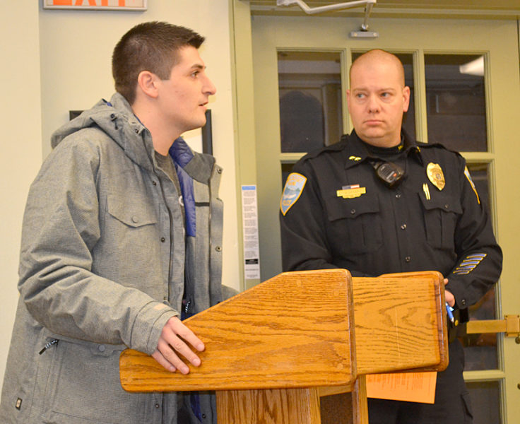 Nick Buscanera, whose dog was attacked by pit bulls, asks the Wiscasset Board of Selectmen to support a disorderly house ordinance at the board's Tuesday, Jan. 3 meeting, as Wiscasset Police Chief Jeff Lange looks on. (Abigail Adams photo)