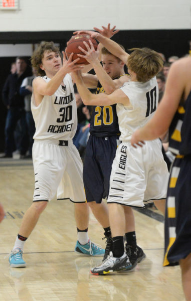 Riley Cushing and Nate Simmons tie up Brent Stewart. (Paula Roberts photo)