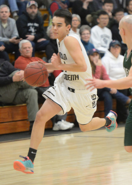 Keyden Leeman brings the ball up the court for the Eagles. (Paula Roberts photo)