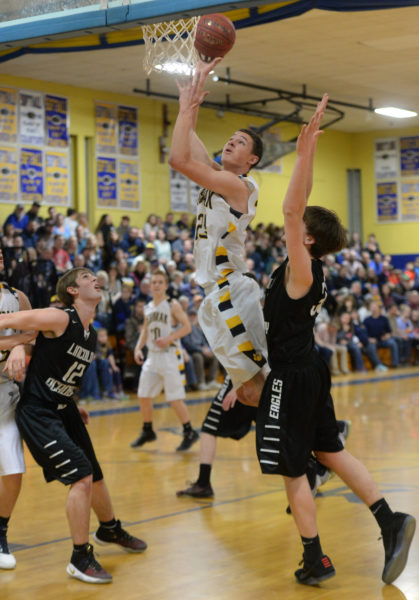 Cameron Allaire drives inside for the Panthers, as Cody Tozier defends for the Eagles. (Paula Roberts photo)