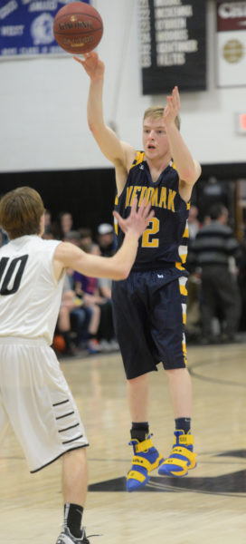 Cale Gee passes the ball over the top in Medomak's come from behind win over Lincoln Academy. (Paula Roberts photo)