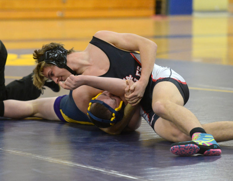 Eagle wrestler Truth Ingham pins Panther Amos Hinkley in the first period. (Paula Roberts photo)