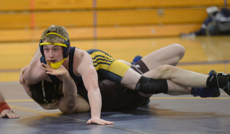 Steven Thompson, pictured hear wrestling at Medomak Valley on Jan. 18, collected his 100th win on Sat., Jan. 21 in a tournament at Ellsworth. Thompson won the 138 pound title in the tournament. (Paula Roberts photo)