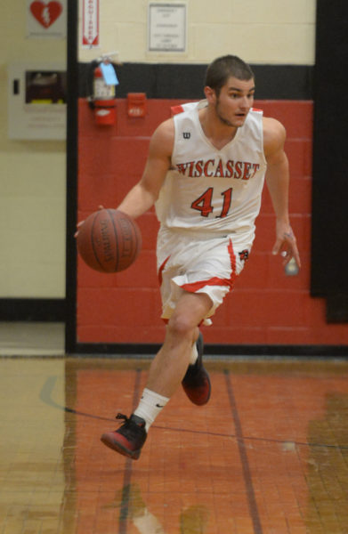 Cody Roberts brings the ball up the court for Wiscasset. (Paula Roberts photo)