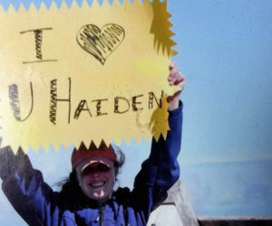 Joanne "Jojo" Russell holds up a sign reading "I (love you) Haiden" at the top of Mount Katahdin. Russell passed away unexpectedly Dec. 6, 2016. (Photo courtesy Margie Hodgdon)