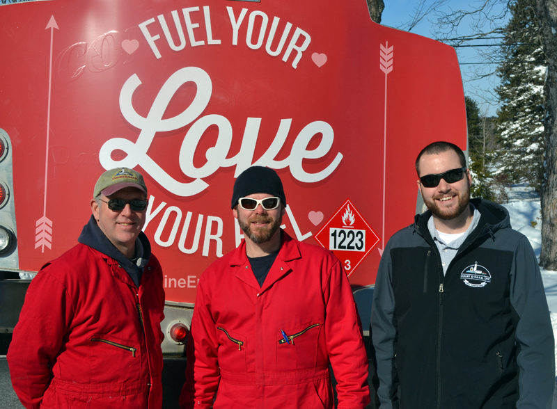 From left: Colby & Gale Inc. drivers Ralph Eugley and Tim Pratt and manager Matt Poole with a specially decorated oil truck on Valentine's Day. Colby & Gale was participating in a statewide event called Fuel Your Love. (Maia Zewert photo)