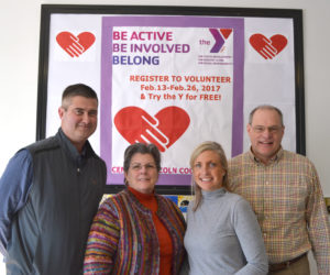 In an effort to help the town of Damariscotta remedy inadvertent violations of grant agreements from the 1980s, the Central Lincoln County YMCA plans to give land to the town. From left: YMCA Board of Directors Chair Dennis Anderson, Damariscotta Board of Selectmen Chair Robin Mayer, CLC YMCA CEO Meagan Hamblett, and Damariscotta Town Manager Matt Lutkus at the CLC YMCA on Friday, Feb. 17. (Maia Zewert photo)