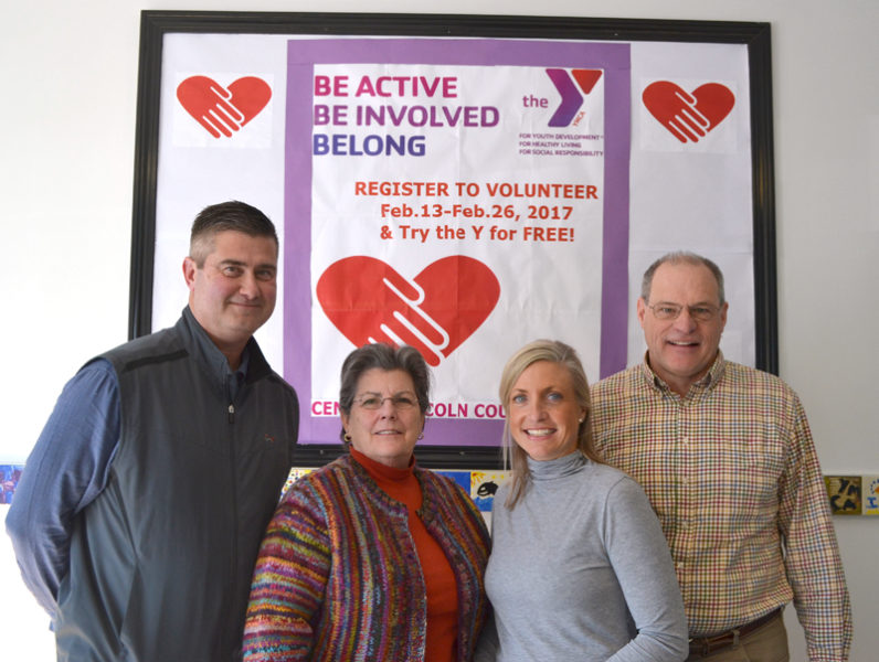 In an effort to help the town of Damariscotta remedy inadvertent violations of grant agreements from the 1980s, the Central Lincoln County YMCA plans to give land to the town. From left: YMCA Board of Directors Chair Dennis Anderson, Damariscotta Board of Selectmen Chair Robin Mayer, CLC YMCA CEO Meagan Hamblett, and Damariscotta Town Manager Matt Lutkus at the CLC YMCA on Friday, Feb. 17. (Maia Zewert photo)
