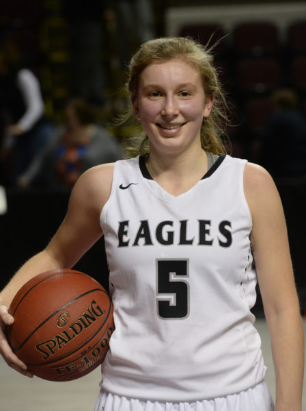 Brie Wajer was presented the game ball after the Lady Eagles quarter-final win over Poland, in honor of her scoring her 1,000th career point. (Paula Roberts photo)