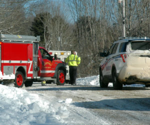 Ambulance, fire, and law enforcement personnel respond to an accident on East Neck Road in Nobleboro the morning of Tuesday, Feb. 14. (Alexander Violo photo)