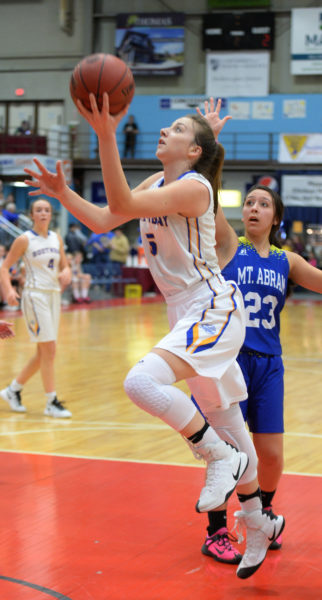 Page Brown drives inside in the Lady Seahawks 60-21 win over Mt.Abram in a South Class C quarter-final game on Feb. 20. (Carrie Reynolds photo)