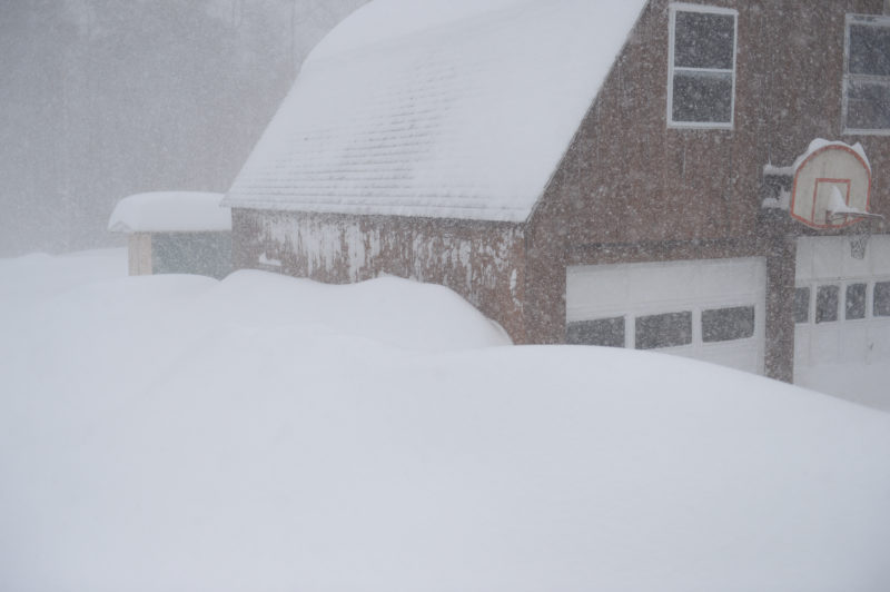 The side windows of this Damariscotta garage are buried under snow during Monday's blizzard. (Paula Roberts photo)