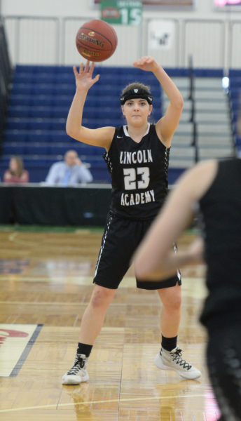 Cagney O'Brien passes the ball to an open Eagle teammate. (Carrie Reynolds photo)