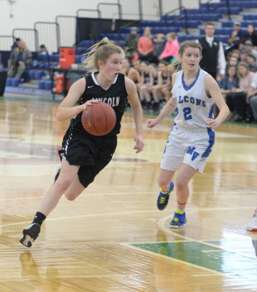 Lincoln Academy senior Brie Wajer drives inside ona breakaway. (Carrie Reynolds photo)