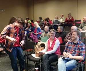 Front row from left: Roosevelt Bishop, Victoria Hamilton, and Joel Biron enjoy some fun with members of The Spit Spot Singers at a recent rehearsal.