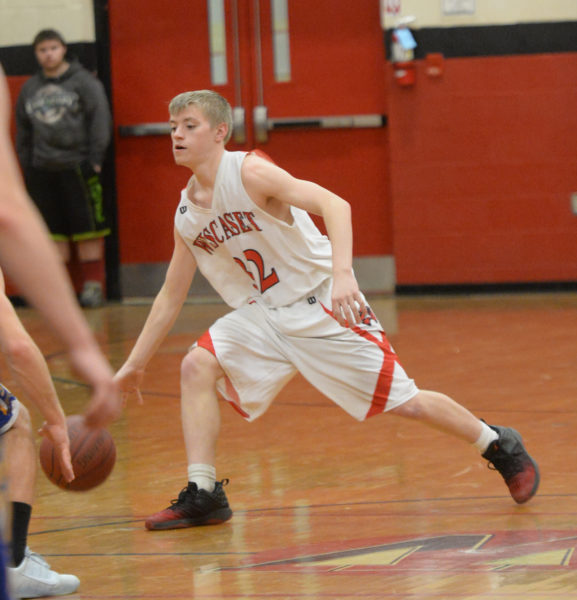 Wiscasset senior Andrew Chubbuck brings the ball up the court for the Wolverines. (Paula Roberts photo)