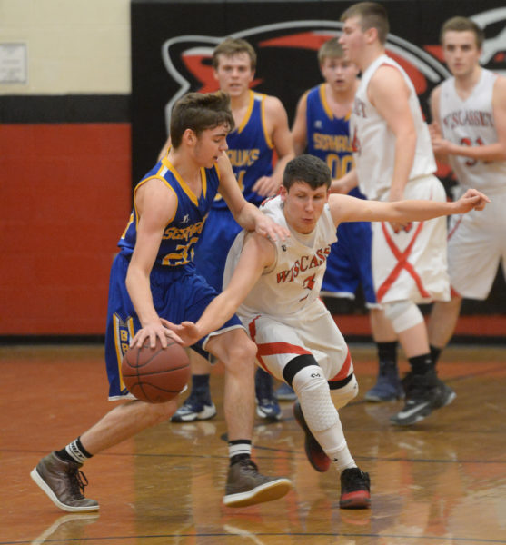 Russell Marr attempts to steal the ball from Seahawk Steve Reny. (Paula Roberts photo)