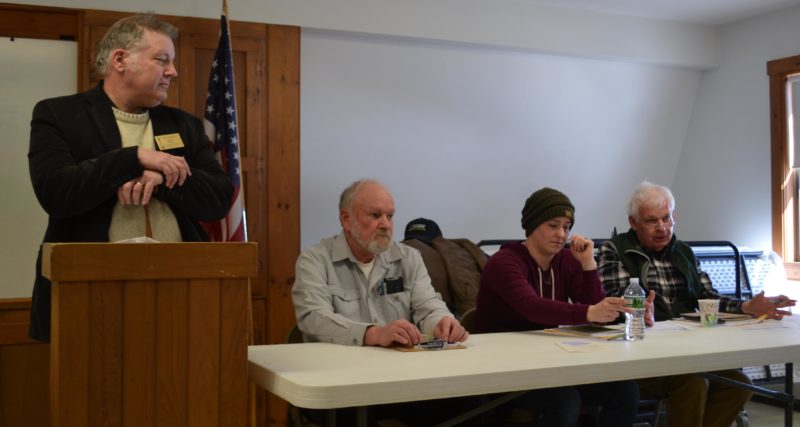 From left, moderator Carl Pease and selectmen Doug Abbott, Melissa Spinney, and Doug Baston oversee Alna's annual town meeting on Saturday, March 18. (Abigail Adams photo)