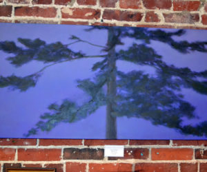 Beverly Walker's large oil painting titled "Midnight" is one of numerous landscape paintings on display at the Damariscotta River Grill as part of the Pemaquid Group of Artists' show running through Tuesday, March 21. (Christine LaPado-Breglia photo)