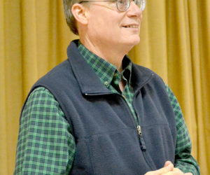 Moderator Carl "Chip" Griffin calls a special town meeting to order Monday, March 27. (Abigail Adams photo)