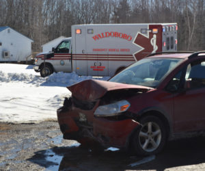 All five occupants of a Suzuki hatchback were transported to the hospital after the car crashed into a veterans monument on Route 32 in Jefferson. (Alexander Violo photo)