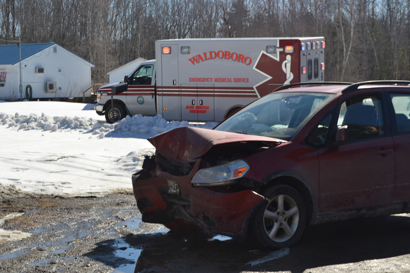 All five occupants of a Suzuki hatchback were transported to the hospital after the car crashed into a veterans monument on Route 32 in Jefferson. (Alexander Violo photo)