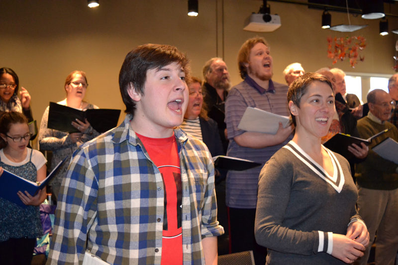 Foreground from left: Roosevelt Bishop, who plays Bert in Lincoln County Community Theater's upcoming production of "Mary Poppins," and Victoria Hamilton, who is in the title role, sing at a run-through of the musical on Sunday, March 12. (Christine LaPado-Breglia photo)