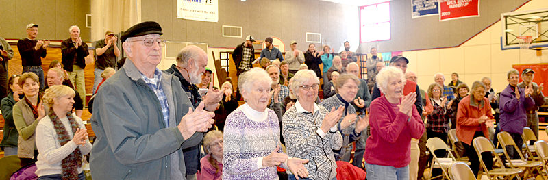 Whitefield residents give David and Barbara Hayden a standing ovation during the annual town meeting Saturday, March 18. The Whitefield Board of Selectmen honored the Haydens with the Spirit of America Award for their volunteerism. (Maia Zewert photo)