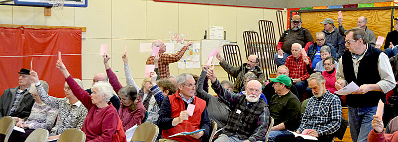 Whitefield Selectman Lester Sheaffer (far right) counts votes during the annual town meeting at Whitefield Elementary School on Saturday, March 18. (Maia Zewert photo)
