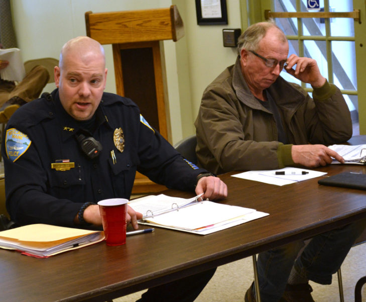 Wiscasset Police Chief Jeffrey Lange presents the department's 2017-2018 budget to selectmen and the budget committee Saturday, Feb. 25, as budget committee member Bryan Buck reviews the proposal. (Abigail Adams photo)