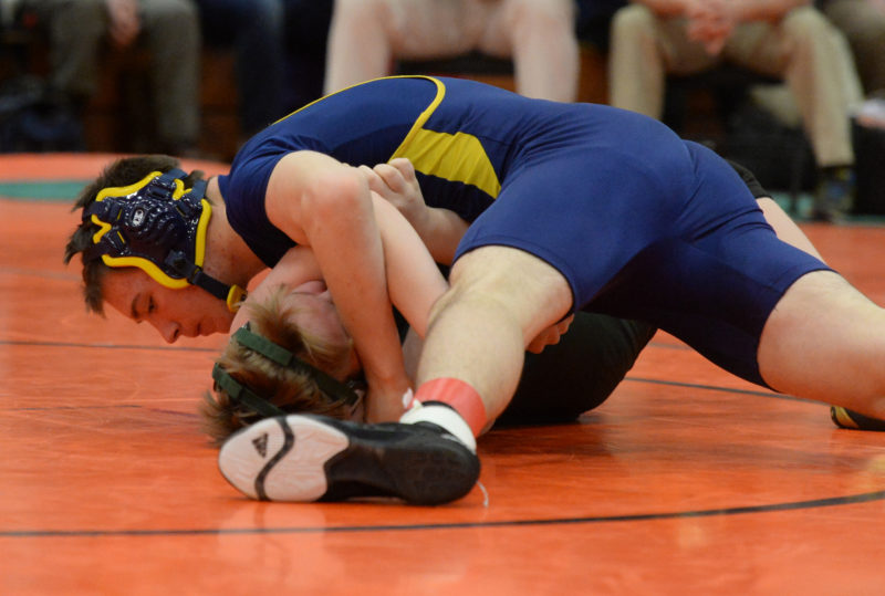 Tyler Cox rolls an Bristol Leahy of Oak Hill for a quick pin at the Pine Tree State Championships. Cox placed second at 155 pounds. (Paula Roberts photo)