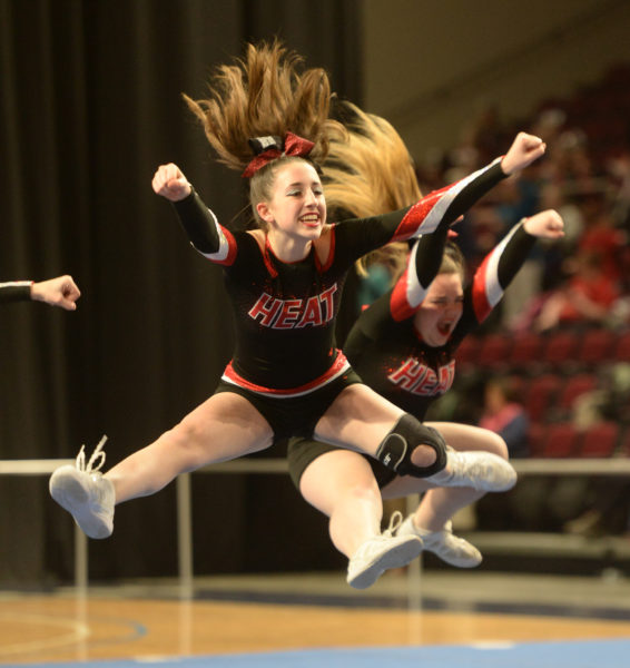 Wiscasset cheerleaders leap into the air during their performance in Bangor on Sunday. (Paula Roberts photo)