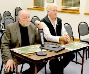 From left: Andrew Sturgeon, director of Maine operations for Hoyle, Tanner & Associates Inc., and Commercial Properties Inc. CEO Daniel Catlin discuss their plans for a retail development at 435 Main St. in Damariscotta during the Damariscotta Planning Board meeting Monday, April 3. (Maia Zewert photo)