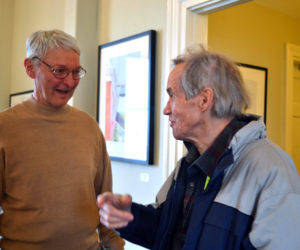 Damariscotta watercolorist Paul Sherman (left) greets one of his fans at the April 21 opening reception for his art show at Savory Maine. (Christine LaPado-Breglia photo)