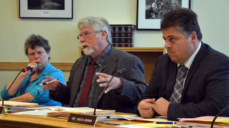 State Rep. John Spear, D-South Thomaston, asks a question during a public hearing on L.D. 972 before the State and Local Government Committee on Wednesday, March 29. Spear is flanked by Rep. Pinny Beebe-Center, D-Rockland, and Rep. Chad Grignon, R-Athens. (Maia Zewert photo)