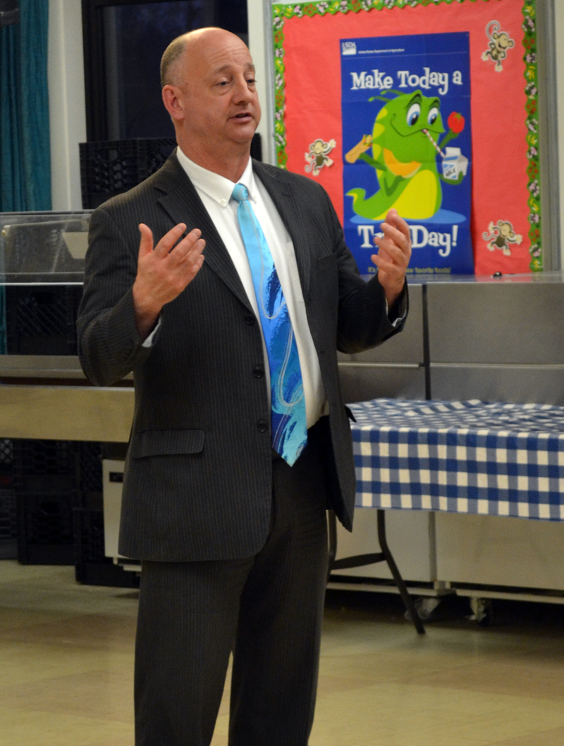 Paul Cavanaugh talks about his interest in serving as district attorney for Maine Prosecutorial District 6 during a caucus at Wiscasset Elementary School on Monday, April 10. (Abigail Adams photo)