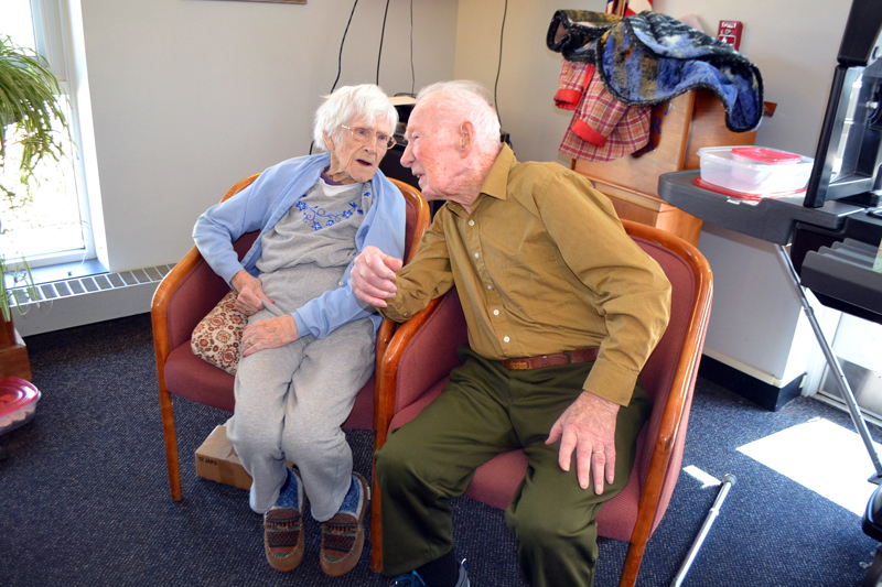 Ruth Applin, age 100, and her brother Arthur Jones, age 99, share a special moment during an open house Saturday, April 15, to celebrate Ruth's 100th birthday, at the Wiscasset Community Center. (Charlotte Boynton photo)