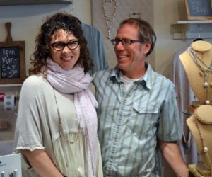 The new owners of In the Clover, Casey and Jay McNamara, prepare to open the store on Main Street in Wiscasset on Monday, April 24. (Abigail Adams photo)