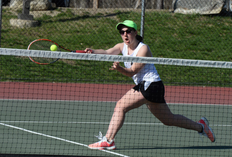 Sandra Thelander returns a shot at the net for the Eagles. (Paula Roberts photo)