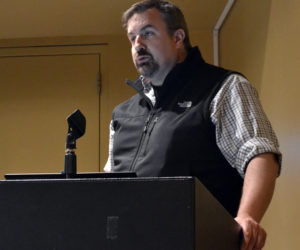 Peter Drum, of Our Town Damariscotta, speaks during a community conversation in the Porter Meeting Hall at Skidompha Library in Damariscotta the evening of Wednesday, May 3. (Maia Zewert photo)