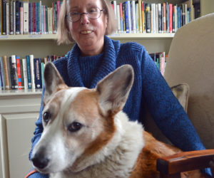 Marianne Pinkham and her grand corgi, Rocket. After 12 years as the director of Spectrum Generations Coastal Community Center in Damariscotta, Pinkham "graduated" March 10. (Maia Zewert photo)