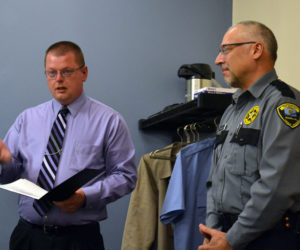 Capt. James Bailey, acting administrator of Two Bridges Regional Jail, names Correctional Officer Derek Maroon the Officer of the Month for April during the Lincoln and Sagadahoc Multicounty Jail Authority Board of Directors meeting Wednesday, May 10. (Abigail Adams photo)