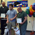 First Canines Graduate from Jail’s New Dog Obedience Program