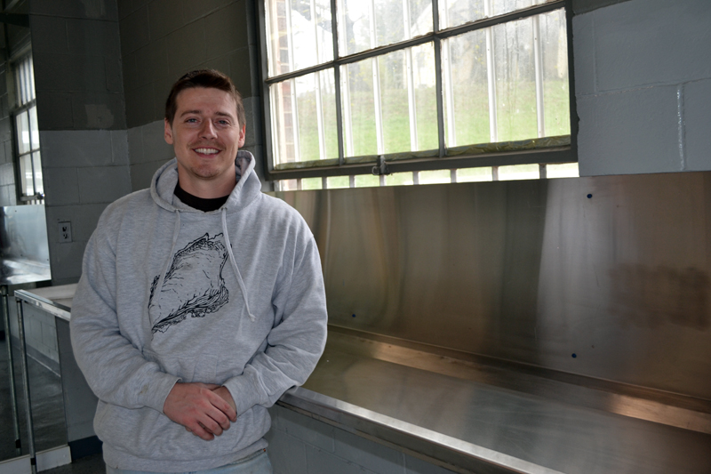Since March, Nobleboro native Brendan Parsons has been operating his oyster distribution business, Damariscotta River Distribution, at 68 Main St. in Newcastle. (Maia Zewert photo)