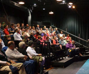 Lincoln Academy senior Kaden Pendleton talks about LA's freshman mentorship program during the spring town hall-style meeting at Parker B. Poe Theater in Newcastle the evening of Tuesday, May 2. (Maia Zewert photo)